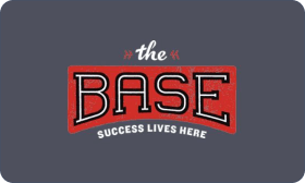 Rooted in growth. Powered by people. Image of The Base's logo in red and white on a dark grey background.