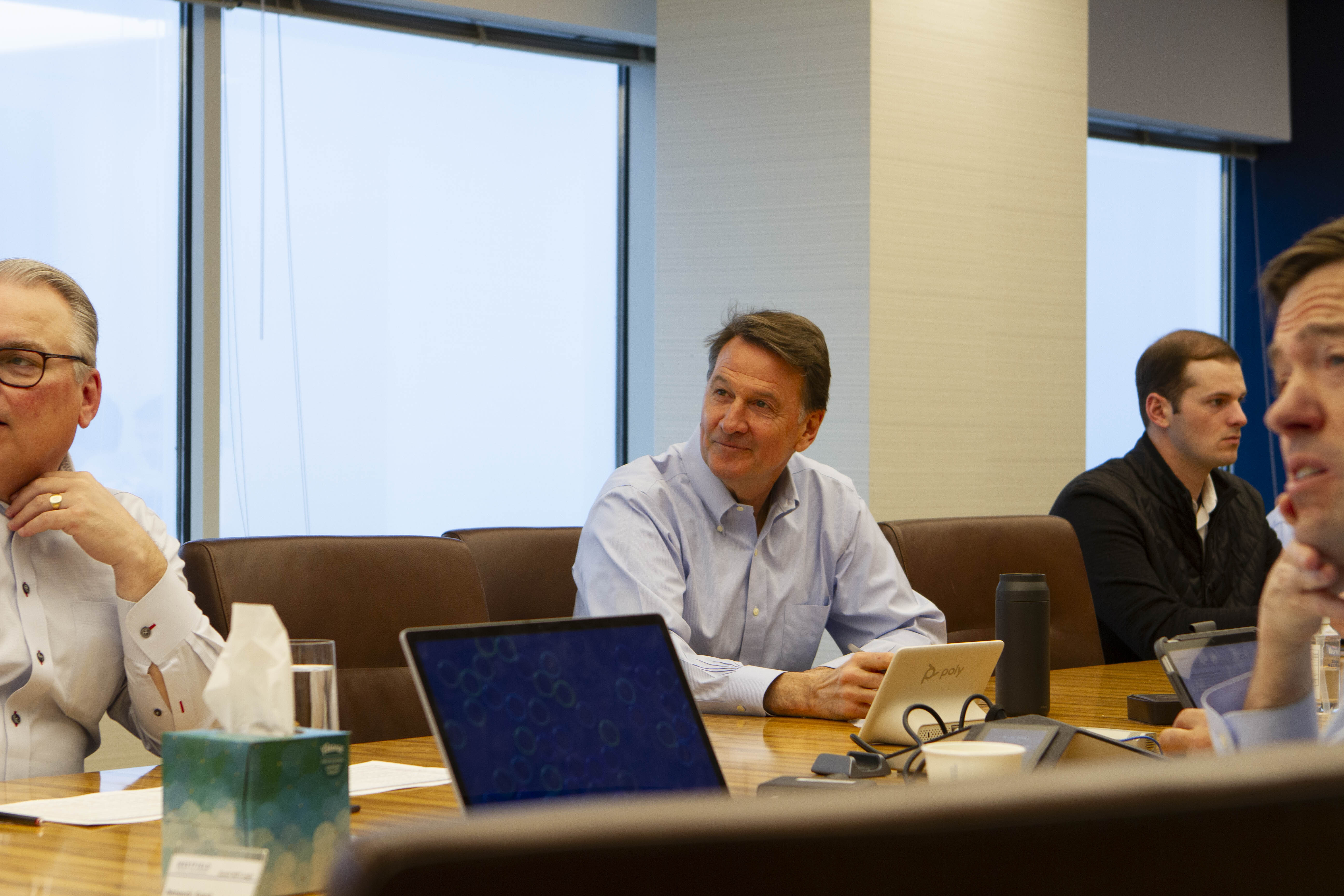 Our Approach. CEO Will Muggia in an Investment Committee meeting in the Westfield board room.