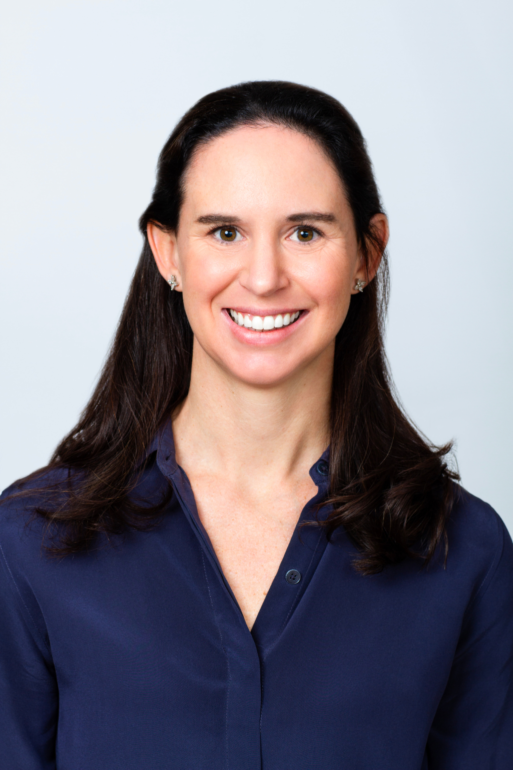 Libby Nelson CFA Senior Manager Marketing & Client Service professional headshot. She is wearing a navy blouse.